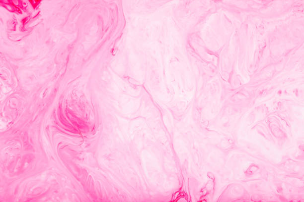 istock Pink liquid paint backdrop. Abstract pink psychedelic background. Fluid Art wallpaper 1424393813