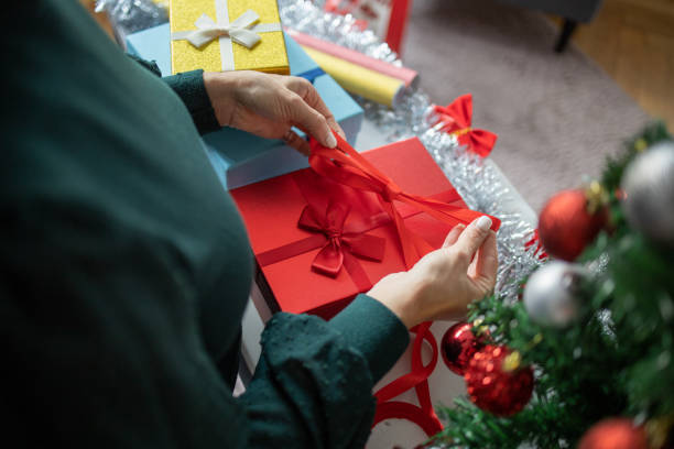 istock Happy woman celebrating Christmas 1424393949