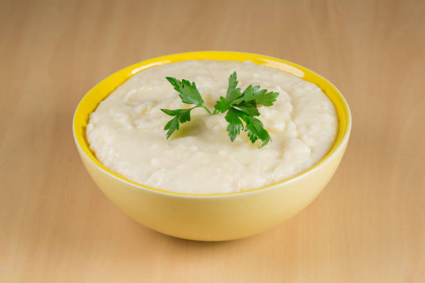 istock mashed potatoes in yellow bowl on wooden background 1424395104