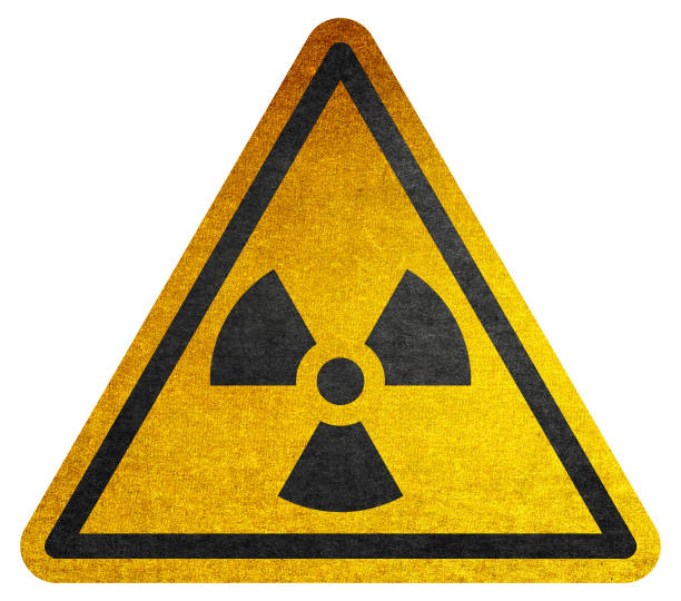 istock Triangular Warning Hazard Sign - Radiation Radioactive stock illustration. Caution radiation symbol vector. Yellow triangle vector stock illustration 1424406110