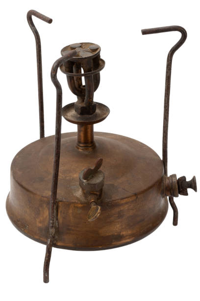 istock Retro vintage bronze primus stove isolated on white background. 1424415954