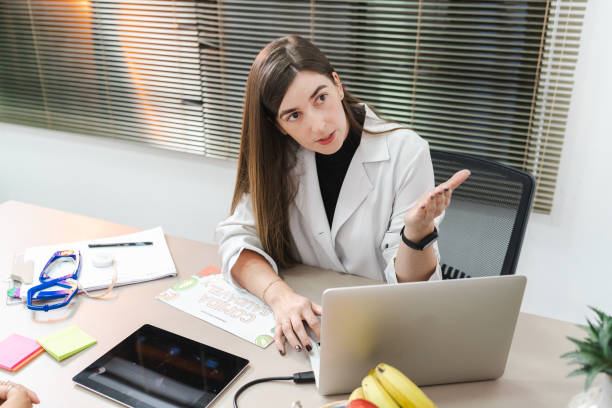 istock Nutritionist attending to client in her office 1424442795