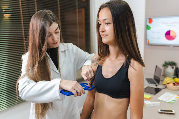 istock Nutritionist attending to client in her office 1424443854