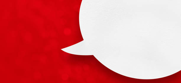 istock christmas white paper speech bubble on red bokeh background 1424449311