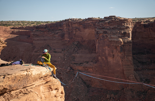Securing the ropes for high-lining in Moab
