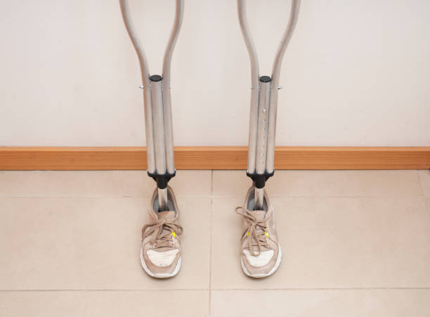 istock crutches and shoes 1424471251