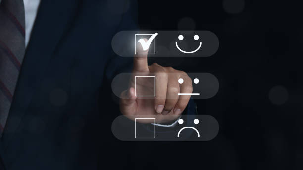 istock Customer service and Satisfaction, Businessman Hand choosing screen on happy Smiley face icon to give satisfaction in service. 1424472991