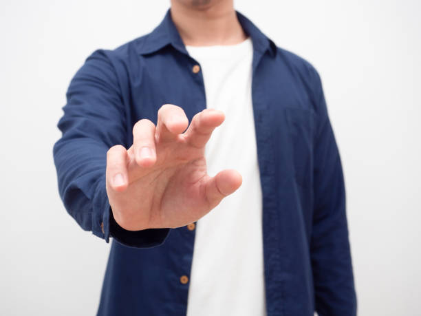 istock Man showing hand for catch something crop shot,Close up man give empty hand 1424479918
