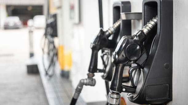 istock Gasoline refuel nozzle head - Transportation energy. 1424488089