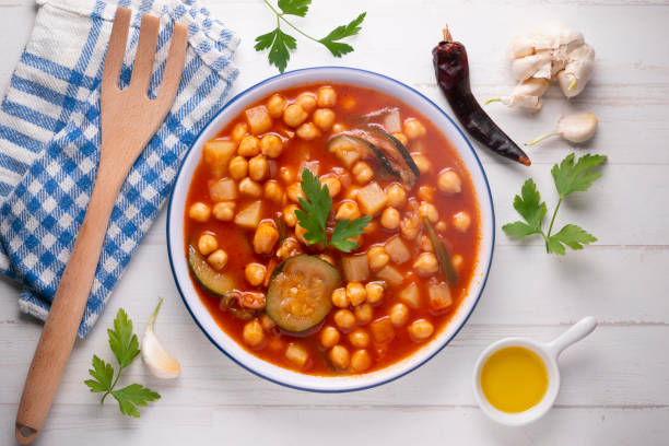 istock Chickpea stew with vegetables. Typical Spanish vegan recipe. 1424496393