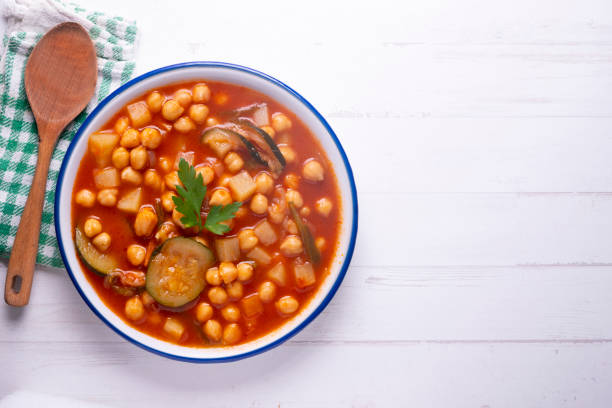 istock Chickpea stew with vegetables. Typical Spanish vegan recipe. 1424496445
