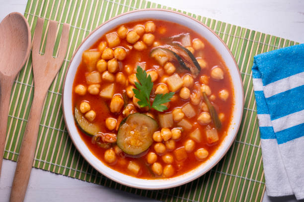 istock Chickpea stew with vegetables. Typical Spanish vegan recipe. 1424496459