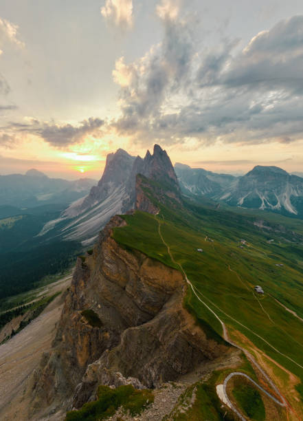 Stunning view of the Seceda ridge during a cloudy day. The Seceda with its 2.500 meters is the highest vantage point in Val Gardena, Dolomites, Italy. stock photo