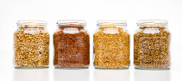 istock Storage jars filled with nuts, grains and cereals 1424505726