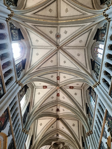 Fribourg Cathedral  is a Roman Catholic cathedral in Fribourg, Switzerland, built in the Gothic style, on a rocky outcrop 50 metres above the river Sarine (Saane). The Image shows the ribbed vault of the main nave.