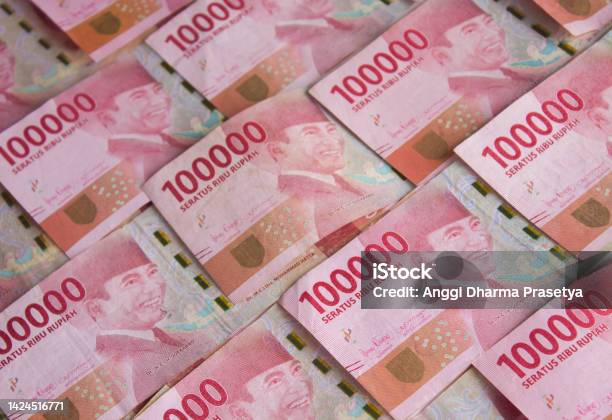 Indonesian Rupiah For Background Indonesian Rupiah Banknotes Series With The Value Of One Hundred Thousand Rupiah Idr 100000 Stock Photo - Download Image Now
