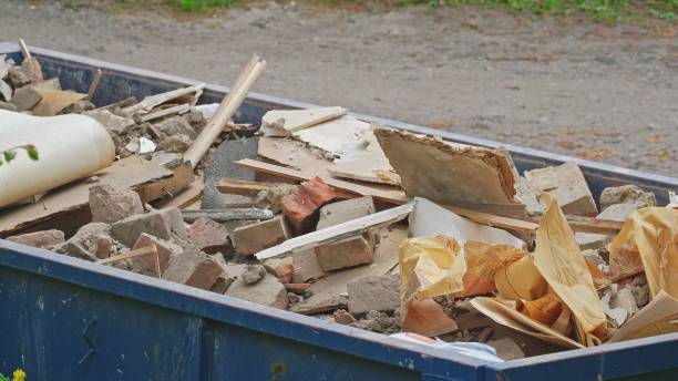 istock Large Metal Dumpster Container Full of Hazardous Construction Material Garbage Waste 1424518725