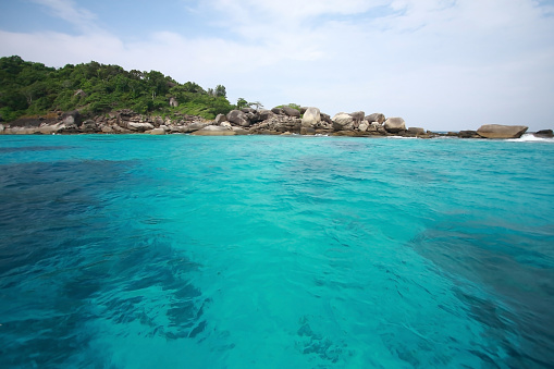 Beautiful sea and clear sky with a white could at Similan Island National Park, Archipelago in Thailand