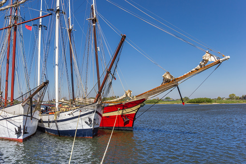 Historic tall ships on the IJssel river in Kampen