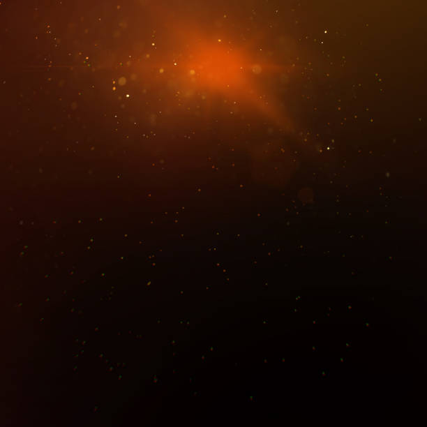 istock texture for overlay, golden glare with sparks on a dark background 1424533273