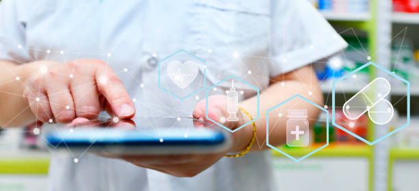 istock Pharmacist using mobile smart phone for search bar on display in pharmacy drugstore shelves background. 1424537510