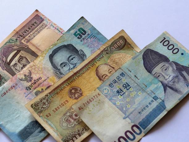 istock Multicurrency bank notes of Asian countries. 1424538859