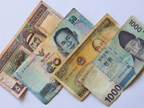 istock Multicurrency bank notes of Asian countries. 1424538872