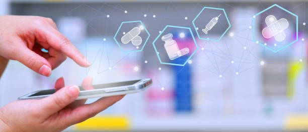 istock Pharmacist using mobile smart phone for search bar on display in pharmacy drugstore shelves background. 1424541194