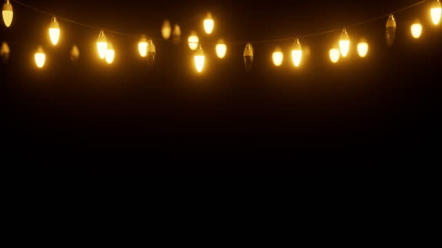 Festival decorative string lights blinking animation with black background and copy space