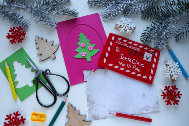 istock making greeting cards for christmas and new year. 1424544479
