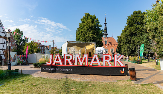 Gdansk, Poland - August 15, 2022: A picture of a large sign to celebrate the St. Dominic's Fair in Gdansk.