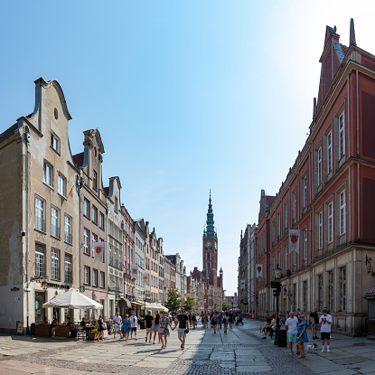 Gdansk, Poland - August 15, 2022: A picture of the Long Street in Gdansk, with the Main Town Hall at the end.