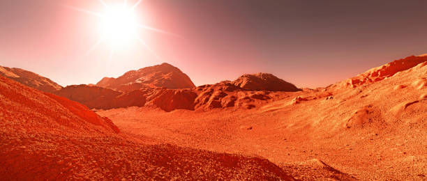 istock Mars planet background, 3d render of imaginary mars planet terrain, orange eroded desert with mountains and glaring sun 1424551648