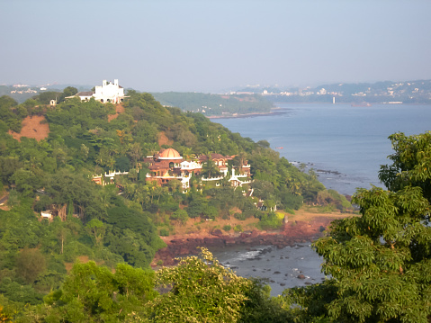 Large colonial-era villas rise on the cliffs of the Goa area, famous for having always been a place of vacation and rest