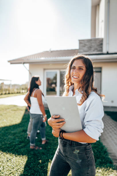 istock couple talking with real estate agent 1424554687
