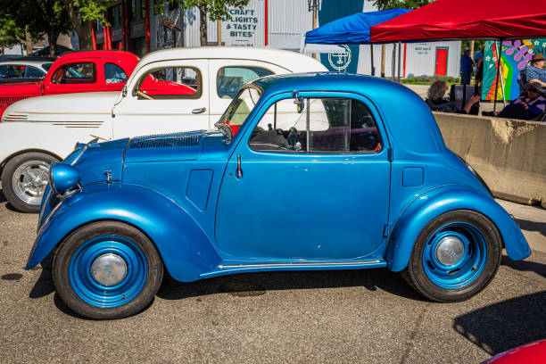 1947 Fiat 500 Topolino Coupe Falcon Heights, MN - June 18, 2022: Low perspective side view of a 1947 Fiat 500 Topolino Coupe at a local car show. fiat 500 topolino stock pictures, royalty-free photos & images