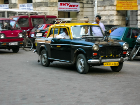 Mumbay, India - oct 31, 2005: traditional Indian taxi in the streets of Mumbai