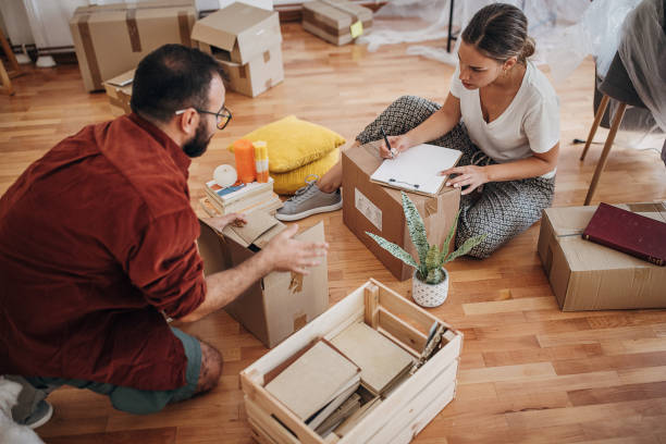 istock Couple moving in new home 1424560918
