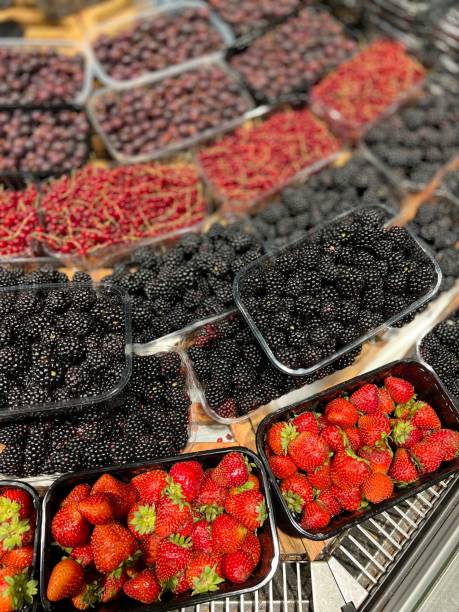 istock blueberries and blackberries in the store 1424563430