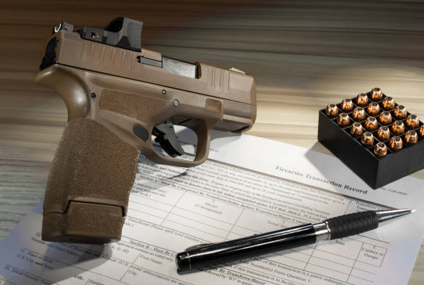 istock Semi automatic handgun and ammo with 4473 1424564612