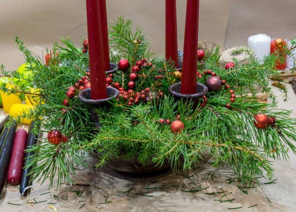 istock Christmas handmade diy background. Making craft xmas wreath and ornaments. Workplace for preparing handmade new year decorations. Winter holidays concept. Home leisure, tools, trinkets and details for holiday decorations 1424565287
