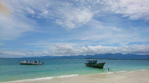 istock BOATS AT KARANG ISLAND 1424566725
