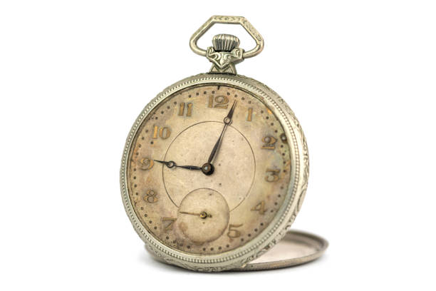 Helsinki / Finland - NOVEMBER 25, 2021: Closeup of vintage pocket watch against studio background.