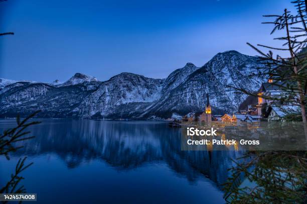 Evening In Hallstatt Am See In Austria With The Alps In The Background Stock Photo - Download Image Now