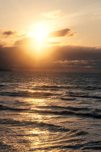 istock Bright warm setting sunset over the sea 1424575437