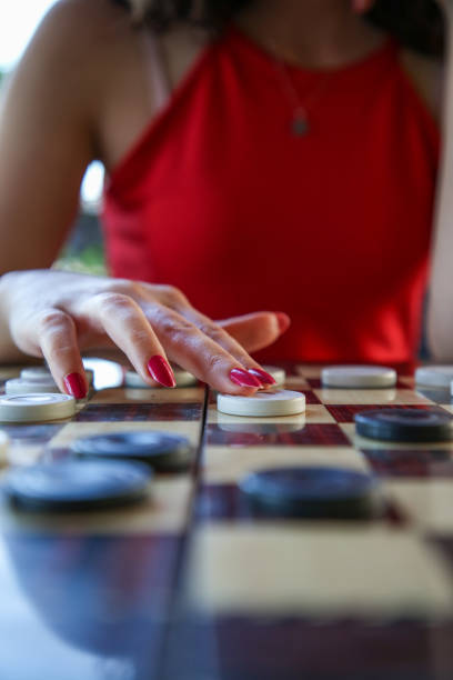 istock A woman plays checkers 1424579946