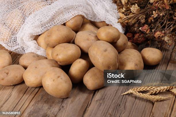 Potatoes Sack Stock Photo - Download Image Now - Prepared Potato, Raw Potato, Sack