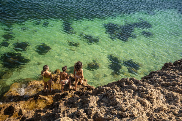 istock Family enjoying the marine corals 1424585536