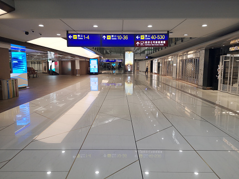 Empty terminal at Hong Kong international airport. Travel is still restricted in Hong Kong due to Covid 19 pandemic after almost 3 years.