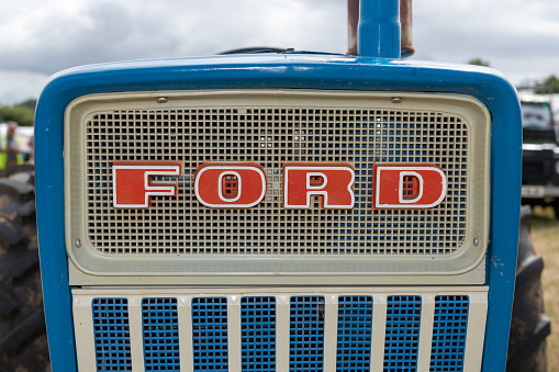 Ilminster.Somerset.United Kingdom.August 21st 2022.Close up of the logo on a restired Ford 3000 tractor on display at a Yesterdays Farming event